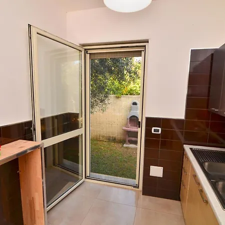 Holiday home Mina Con Giardino A